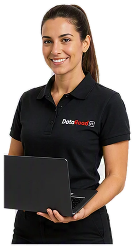 Smiling woman in a black DataRoad polo holding a laptop, ready to assist.